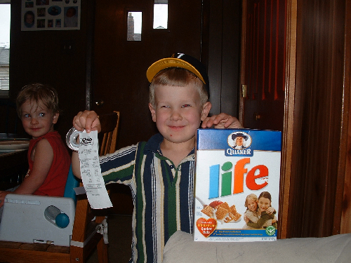 Jonathan with cereal and receipt